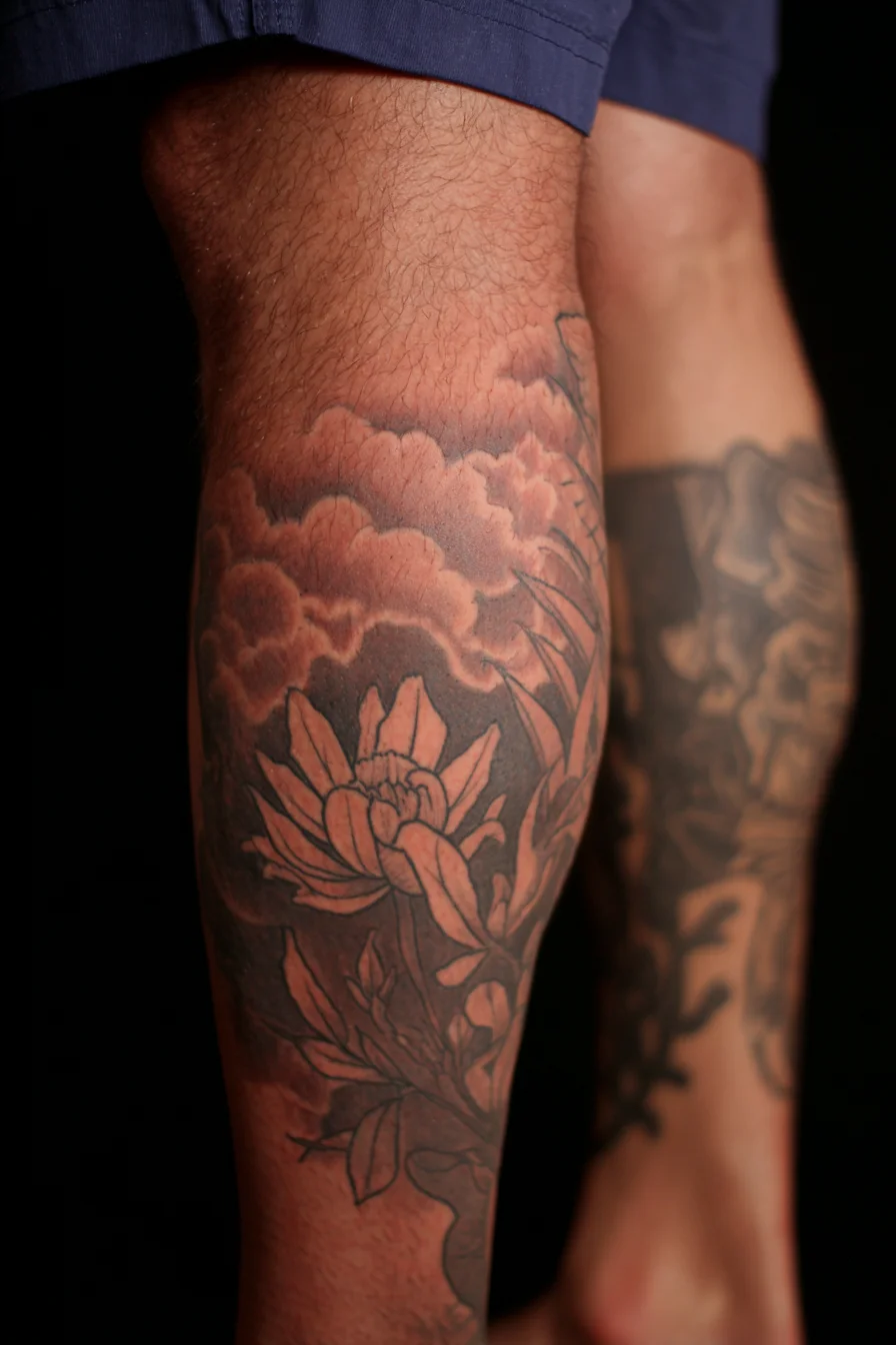 Black & Grey Floral Calf Tattoo — Lotus/Peony with Cloud Shading