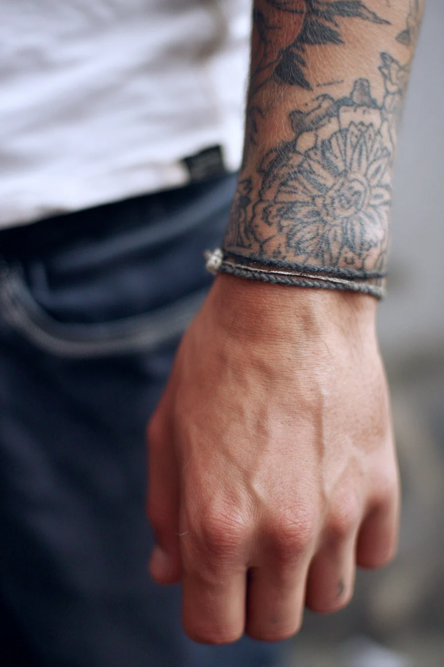 Blackwork Floral Wrist & Forearm Tattoo — Linework Flower Band