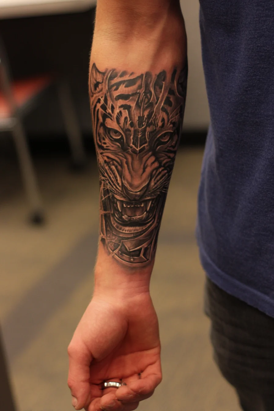 Fierce Tiger Forearm Tattoo — Black & Grey Realism