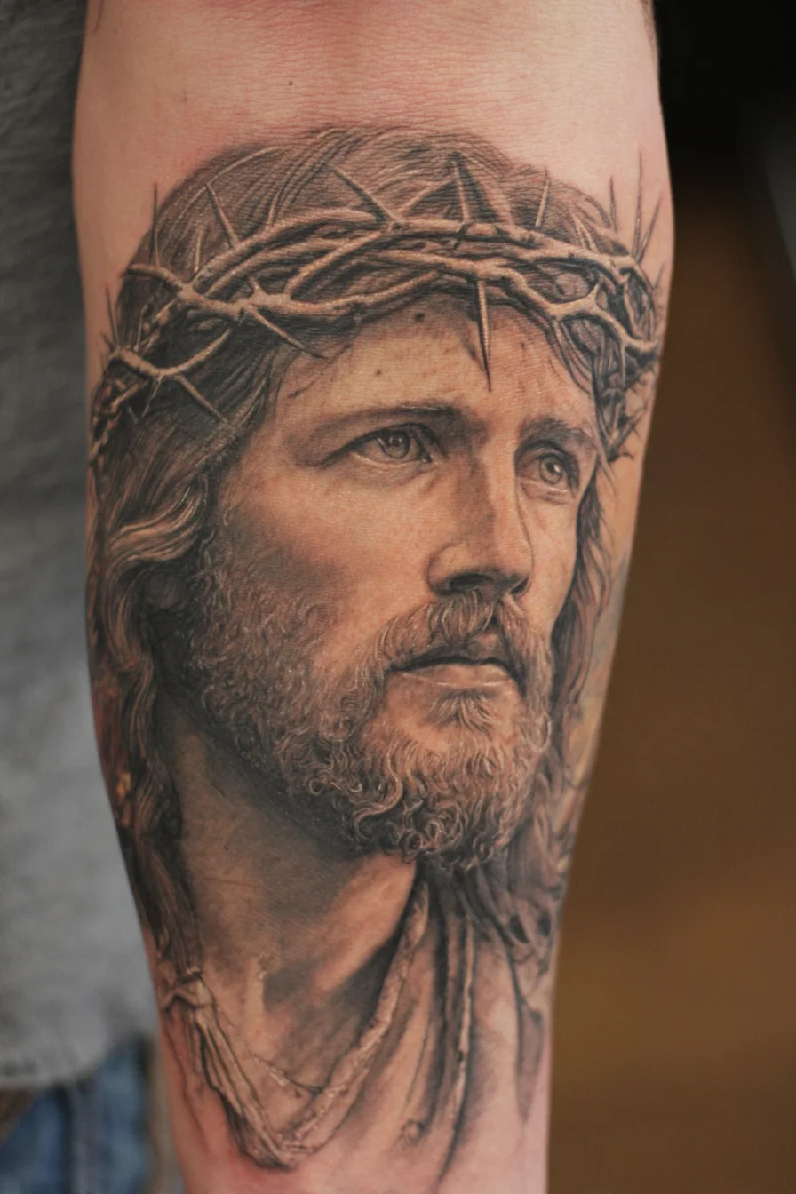 Realistic Christ Portrait with Crown of Thorns — Forearm Religious Tattoo