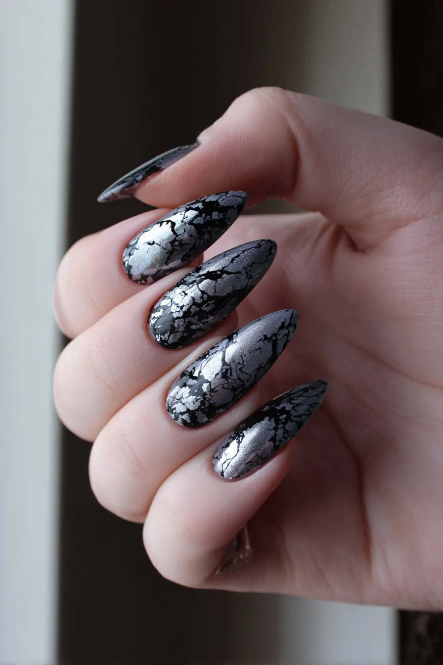 Cracked Chrome Marble Tattoo — Black & Silver Textured Blackwork