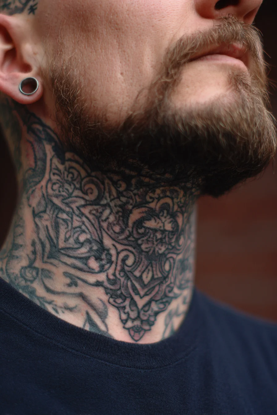 Ornamental Blackwork Neck Tattoo — Mandala Baroque Neckpiece